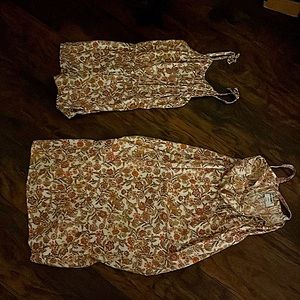 I am selling a romper and a dress the fabric is soft size is 12